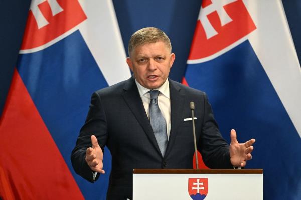 Slovakia's Prime Minister Robert Fico gesturing during a press co<em></em>nference at Carmelita mo<em></em>nastery in Budapest