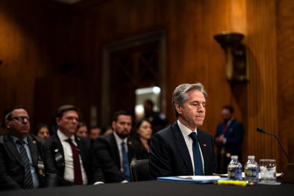 U.S. Secretary of State Antony Bl<em></em>inken pauses while a Pro-Palestinian demo<em></em>nstrator is forcibly removed from a Senate Foreign Relations Committee hearing.