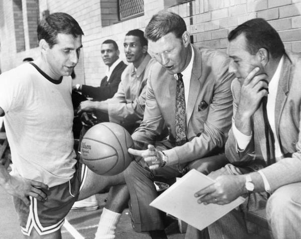 Bulls assistant coach Al Bianchi, from left, head coach Johnny 