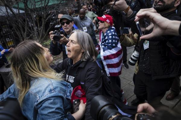 Pro-Trump protesters argue with counter-protesters.