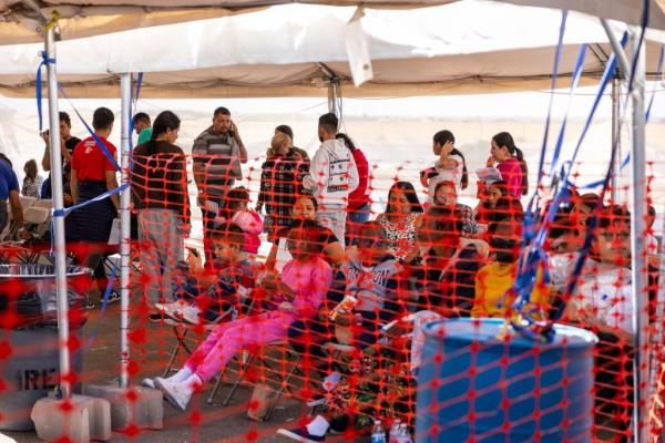 Migrants arrive at the Regio<em></em>nal Center for Border Health in Yuma, Arizona, after being released by Border Patrol.