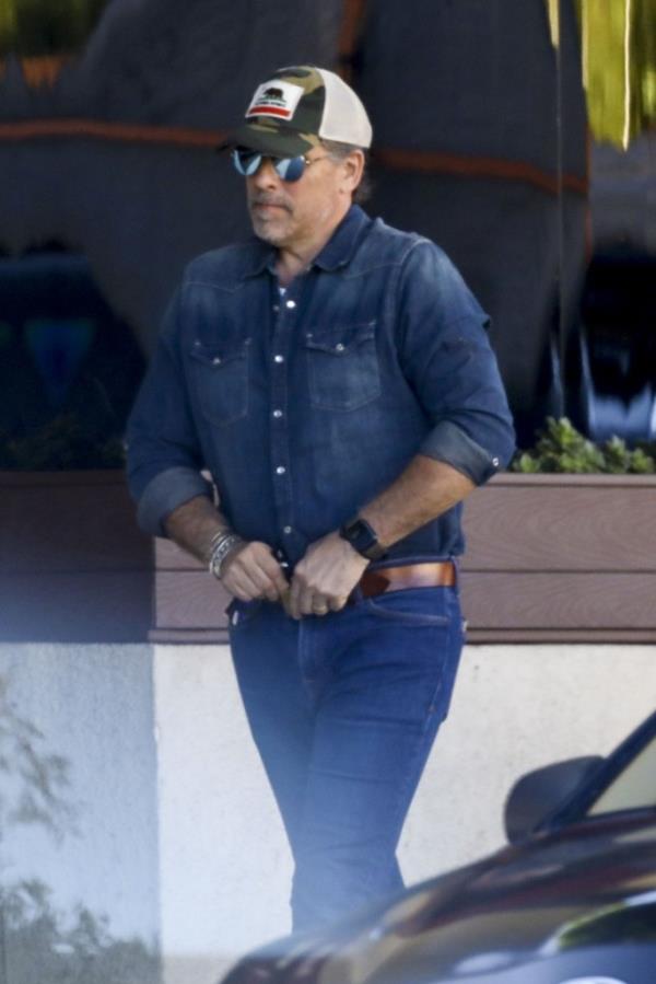 Hunter Biden is seen cinching his belt outside a Beverly Hills eatery