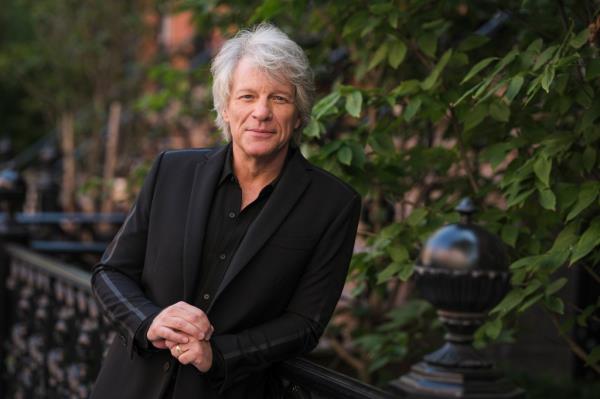 Jon Bon Jovi posing in a black suit in New York for a portrait promoting his new album '2020'