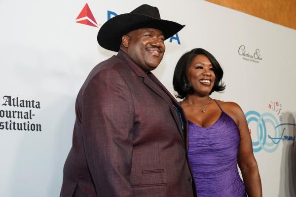 Country musicians The War and Treaty posing on the red carpet at the 'Jimmy Carter 100: A Celebration in Song' event in Fox Theater, Atlanta, Georgia