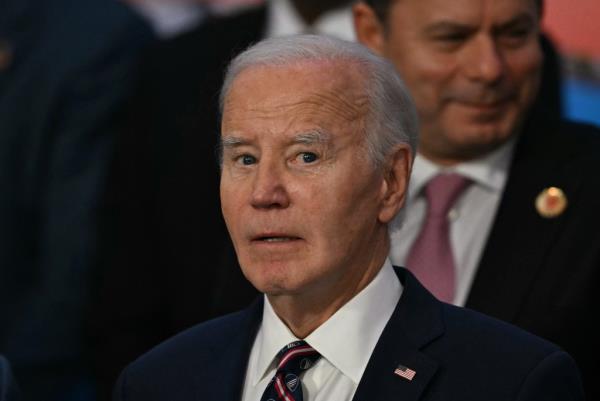 President Joe Biden is pictured during the group photo after attending the meeting on Sustainable Development and Energy Transition at the G20 Leaders' Meeting in Rio de Janeiro, Brazil, on November 19, 2024.