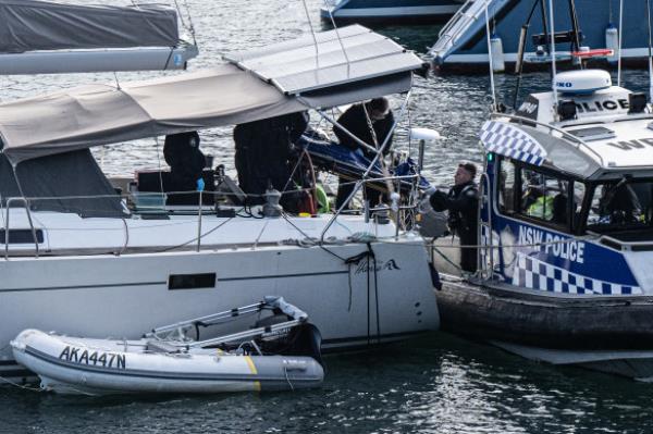 Police removed two bodies from the yacht on Thursday morning. 