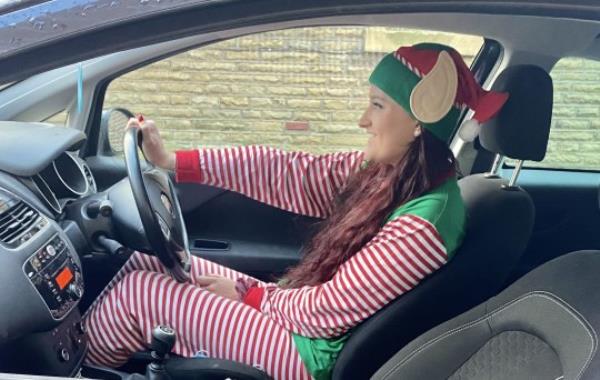 Roxy dons the Mental Elf costume everywher<em></em>e she goes