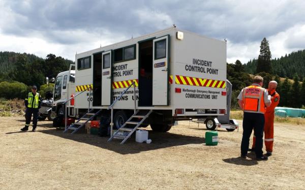 Richard McNamara and Rich Law, from the Blenheim rural fire force, in front of the incident co<em></em>ntrol point.